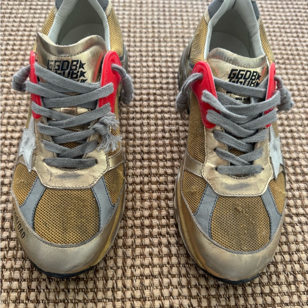 Golden Goose Deluxe Brand Gold Sneakers